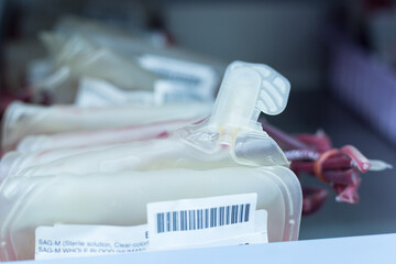 Close up red blood bag in storage blood refrigerator at blood bank unit laboratory.Save life and...