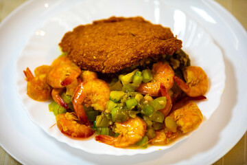 Traditional Brazilian acarajé, food of African origin based on vatapá, caruru and dry shrimp 