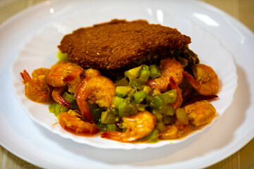 Traditional Brazilian acarajé, food of African origin based on vatapá, caruru and dry shrimp 