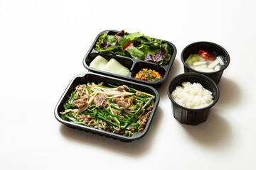 Stir-fried meat and side dishes in packaging containers, Korean food