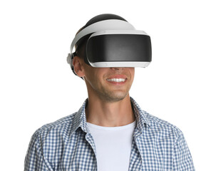 Smiling man using virtual reality headset on white background