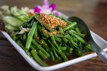 Stir fired Chinese water morning glory or water spinach with soybean paste. Thai-Chinese dish