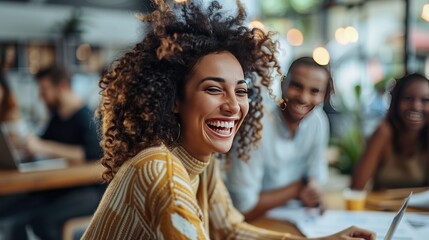 Obraz premium Joyful Laughter of a Young Woman with Curly Hair