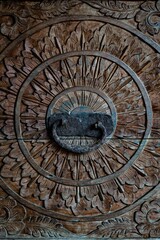 Wood hand carved Javanese art piece, texture
