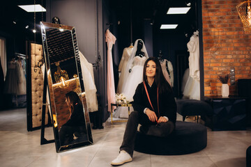Women's fashion designer in a wedding salon
