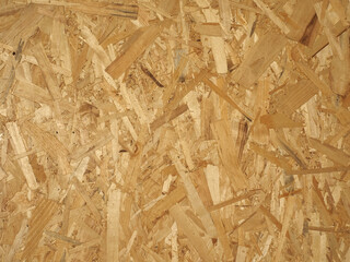 yellow brown oriented strand board wood texture background