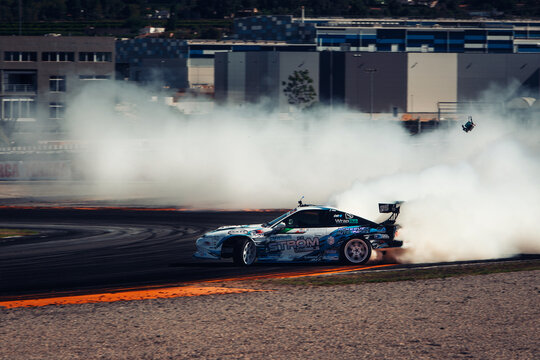 Nissan S14 in drift with a lot of smoke