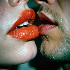 A man and a woman are kissing each other's lips