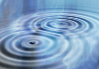 Water, ripple and ring in lake with movement, texture and natural for creativity or backdrop....