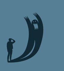 Silhouette of a Man Looking at His Monster Shadow. States of psyche and mind concept. Mental health and psychology issues.