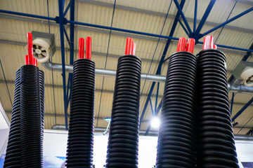 Flexible insulated pipes in polyurethane foam insulation for central and hot water supply systems.