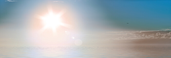 Obraz premium Sun flare, ocean and blue sky with water in nature wallpaper for natural environment of tropical horizon in summer. Beach, sunrise and paradise for peace sea outdoors and view background of adventure