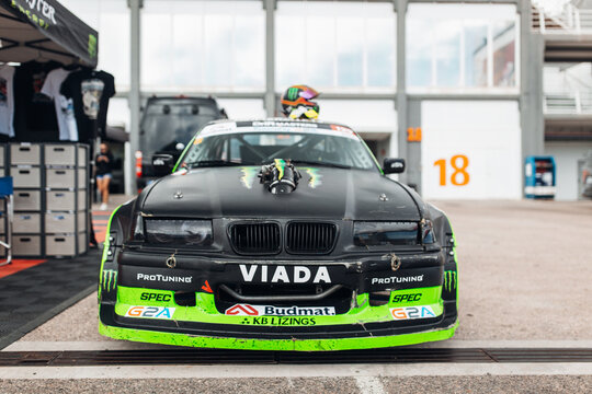 Nik Nak BMW E36 HGK Dogfighter racecar at the paddock