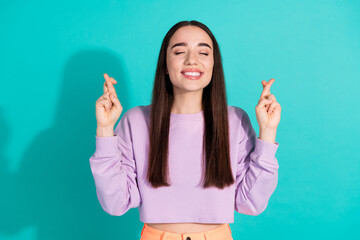 Photo portrait of lovely young lady make wish crossed fingers dressed stylish violet garment...