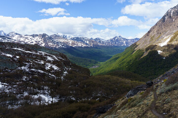 The view of Andean mountains with little snow and a green valley on the way to the Sheep Pass, Ushuaia - Argentina, Paso de la Oveja