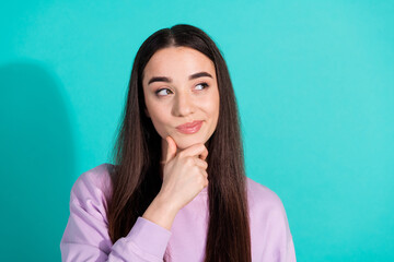 Photo of lovely young lady look skeptical interested empty space dressed stylish violet garment...