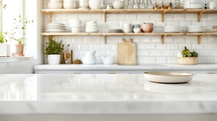 Clean white kitchen countertop with a blurred background of shelves with neatly organized dishes.