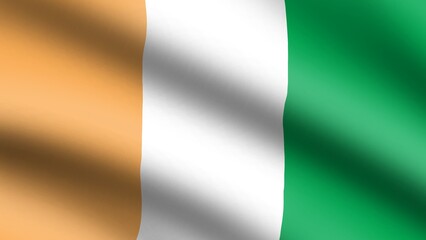 Wavy and flown national flag of Côte d’Ivoire Republic also known as Ivory Coast. Tricolour flag of orange, white, and green stripes.