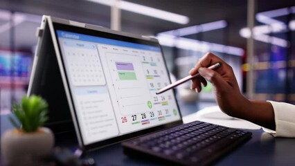 Digital Businesswoman Organizing Calendar Appointments and Meetings on Laptop