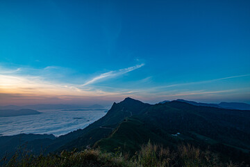 On the top of the mountain in the morning with beautiful mist.