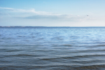 Obraz premium Clouds, blue sky and wallpaper with ocean in nature for outdoor peace, environment and waves. Coast, earth and background of water in sea for climate, scenery and travel destination in Maldives