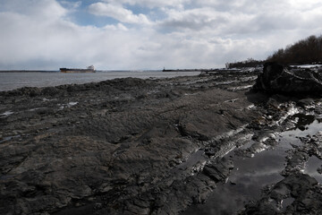 cargo ship crosses off the coast of St François Beach ,Île d'Orléans, Quebec