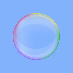 Soap bubble with rainbow reflection on blue background