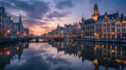 Fototapeta premium A city with a river running through it and a bridge over it