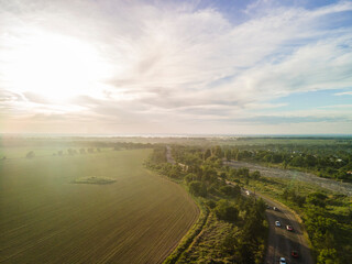 Aerial photography of fields at the foot of the mountains.