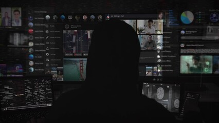 Person Working on Holographic Screen. Several Interfaces and Videos Playing. Augmented Reality, Artificial Intelligence. Hooded Man Typing On Computer. Futuristic Visualization. Social Media.  - Powered by Adobe