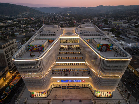 Aerial view of the National Library of El Salvador (BINAES) in main square of the historical center of the capital city San Salvador, shot at sunset time.	