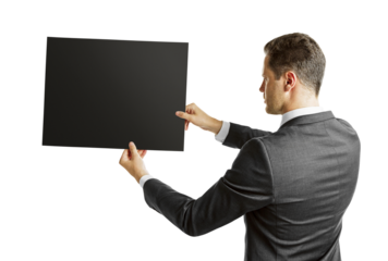 Businessman in a suit holding a blank black board, photo on a white background, concept of advertising and presentation