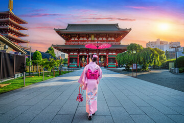 Asian woman wearing japanese traditional kimono at Temple in Tokyo, Japan.
