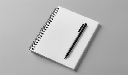 Fototapeta premium Pen and paper, spiral notebook with a blank white page, photography, minimalist