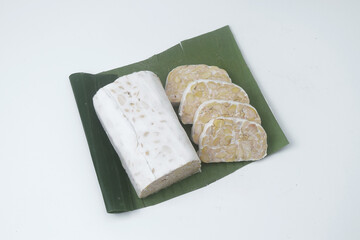 Close up photo of pieces of food made from fermented soybeans is called Tempe