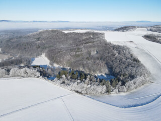 Aerial view of a landscape with snow in winter 