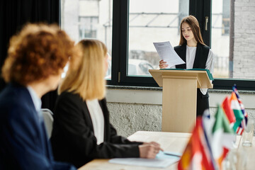 Teenagers engage in a simulated UN debate.