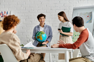 Teenagers participate in a UN Model session, discussing global issues with a globe as a prop.