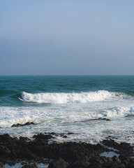 Fototapeta premium waves on the sea, Jeju, South Korea