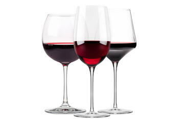 Set of red wine glasses isolated on white background. Rose wine splashing in glassware.