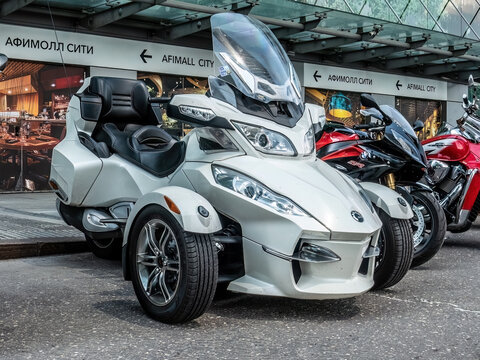 BRP Can-Am Spyder Roadster tricycle parked on city street