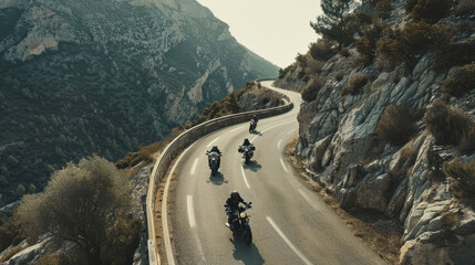 Motorcyclists riding along a winding mountain road