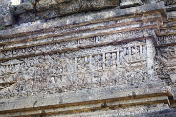intricate reliefs at Jago Temple, capturing the artistry and cultural significance of this historic site, perfect for educational and creative projects