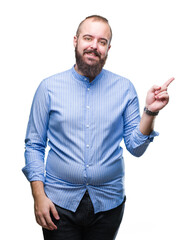 Fototapeta premium Young caucasian hipster man over isolated background with a big smile on face, pointing with hand and finger to the side looking at the camera.