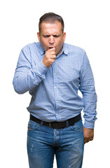 Middle age arab business man over isolated background feeling unwell and coughing as symptom for...