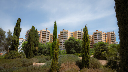 Condominiums i with lush greenery, park in Valencia, Spain