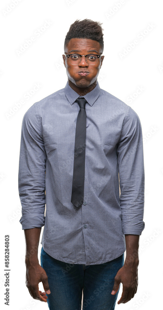 Sticker young african american business man over isolated background puffing cheeks with funny face. mouth i