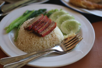 steamed rice topped with chicken