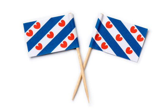 Miniature Frisian paper flags close up isolated on white backgroundbackground