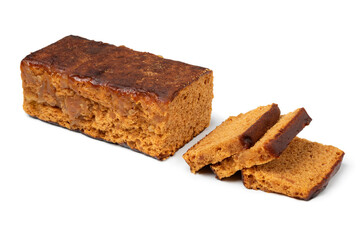 Traditional Dutch ginger breakfast cake and slices isolated on white background close up
